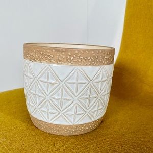 White patterned ceramic pot for plant